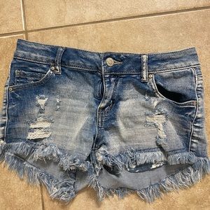 Light Wash Shorts with Fringe